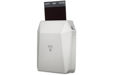 Side view of White INSTAX SHARE® SP-3 printer with picture