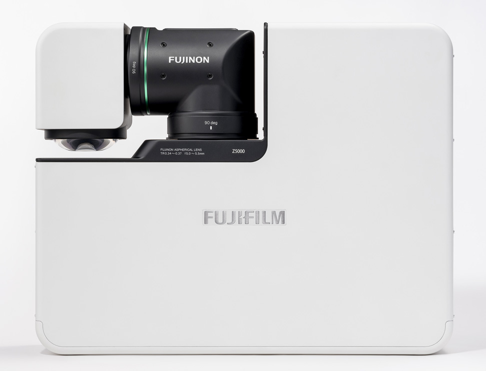 [photo] Top of white FP-Z5000 in compact position with projector lens swiveled closed