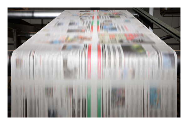 [photo] Printing on a paper in progress on a printing machine